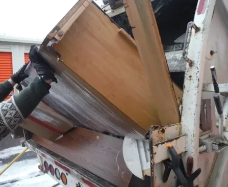 broken table in junk removal truck